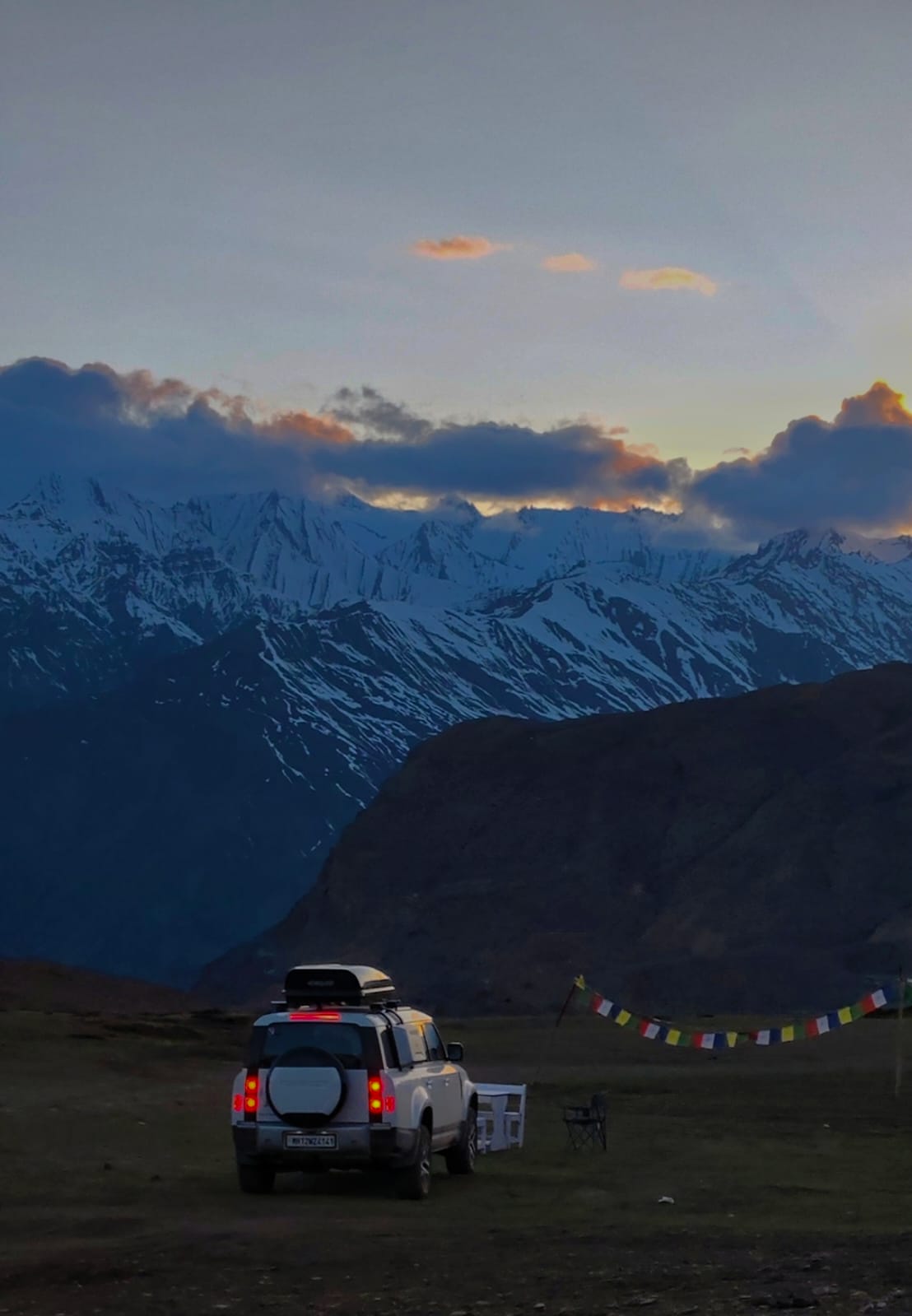 Expedition vehicle at high-altitude camp